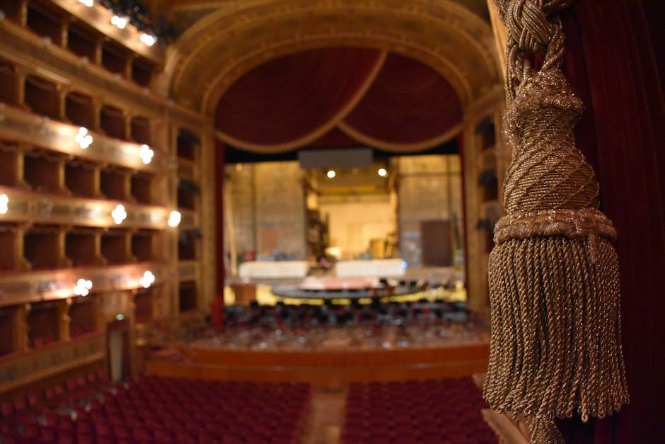 Ornate golden tassel framing the auditorium of Ravenna's theatre