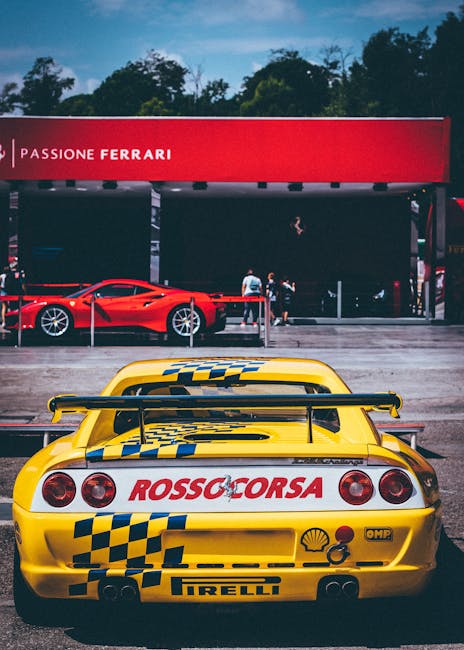 Yellow Rosso Corsa race car at a Ferrari exhibit in Modena