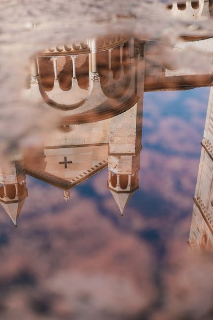 Riflesso del Duomo di Modena visibile in una pozzanghera