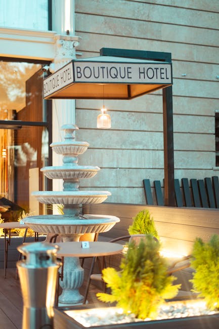 Boutique hotel terrace with fountain in the evening