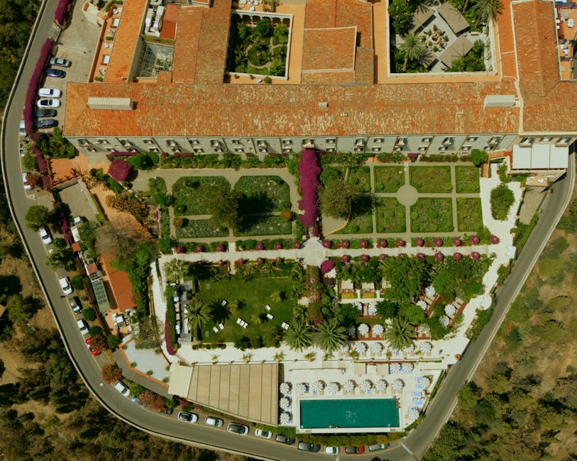 Aerial view of Capri hotel gardens and rectangular swimming pool