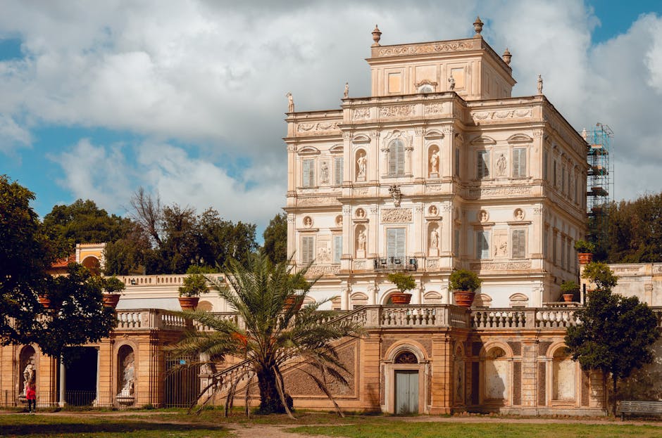 Ornate historic villa facade overlooking formal gardens near Lac Majeur