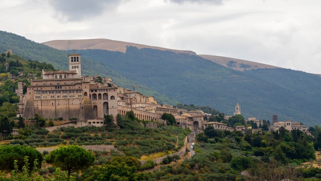 Hilltop monastery and medieval town overlooking Umbria valley
