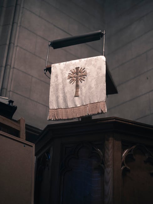 Embroidered liturgical lectern cloth with cross on pulpit, Umbria church