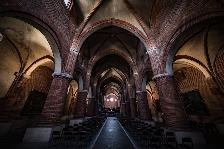 Interior of Basilica di San Nicola with shadowed columns during a concert