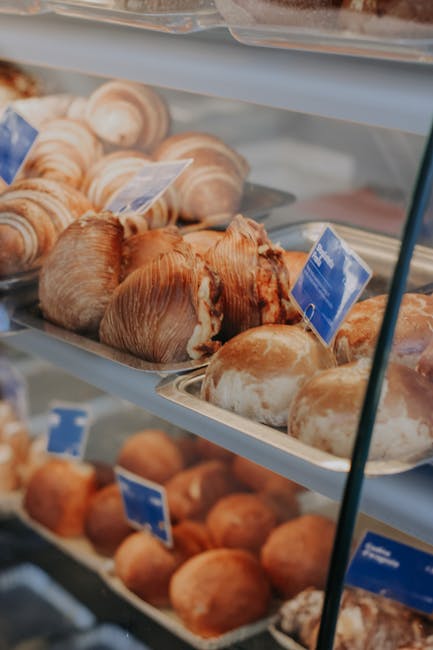 Bakery display in Bari showing assorted pastries and stuffed panzerotti