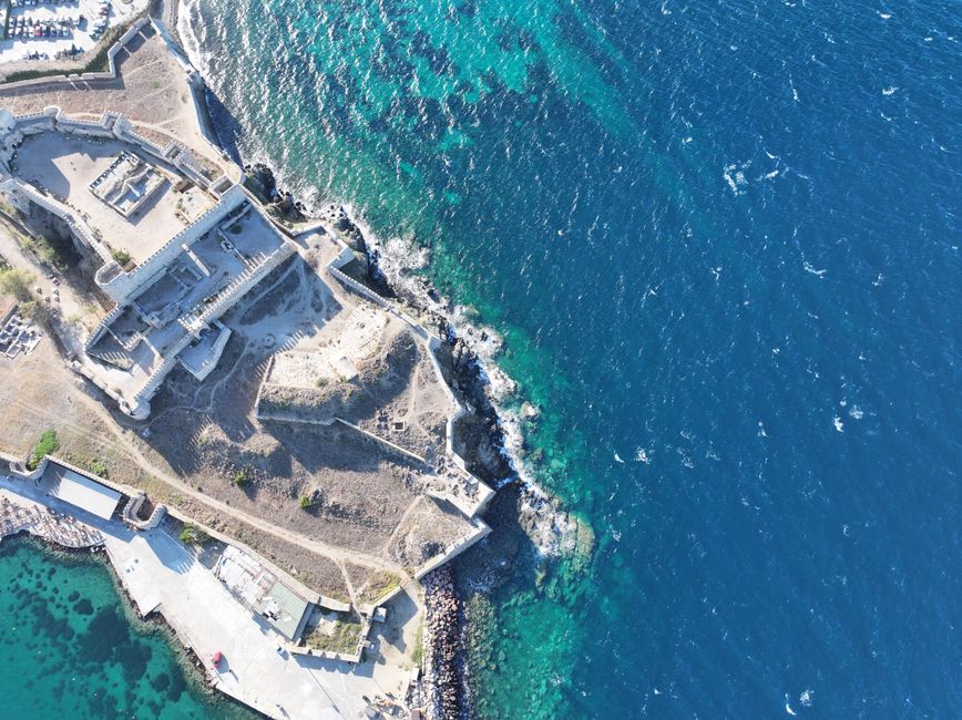 Aerial view of Bari coastline and rocky promontory fortress ruins