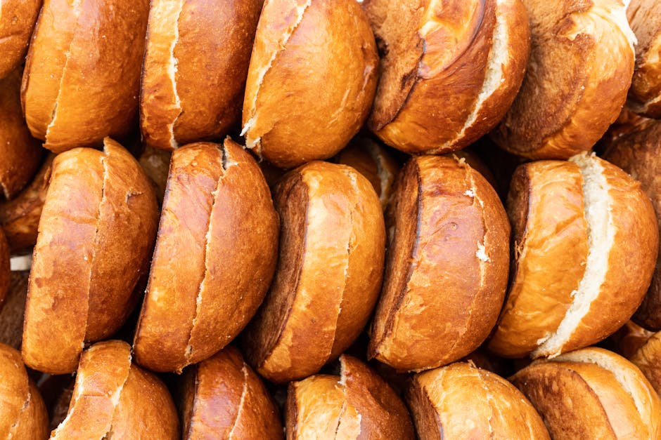 Stack of golden brioche buns ready for granita pairing in Catania
