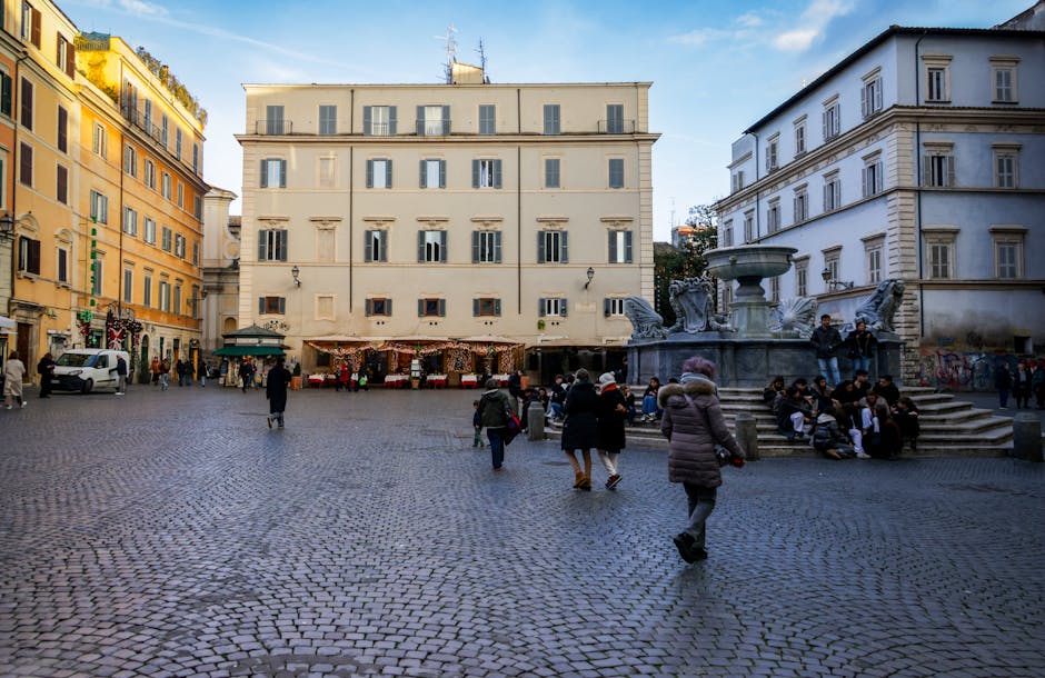 Belebter Platz mit Brunnen und Marktständen in Latium