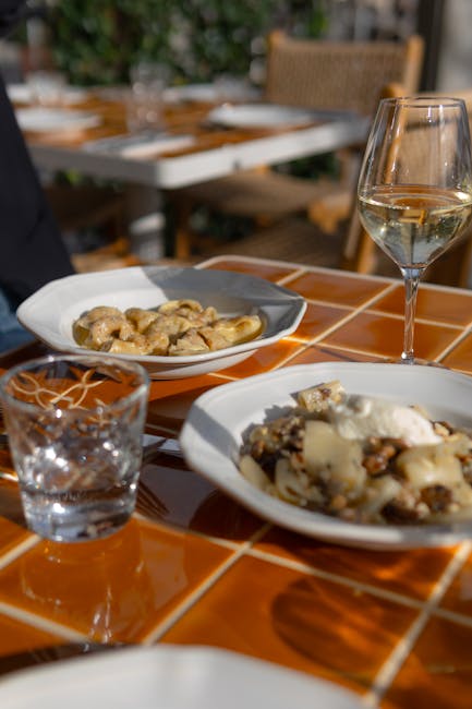 Cozy lakeside trattoria plate of pasta and local wine