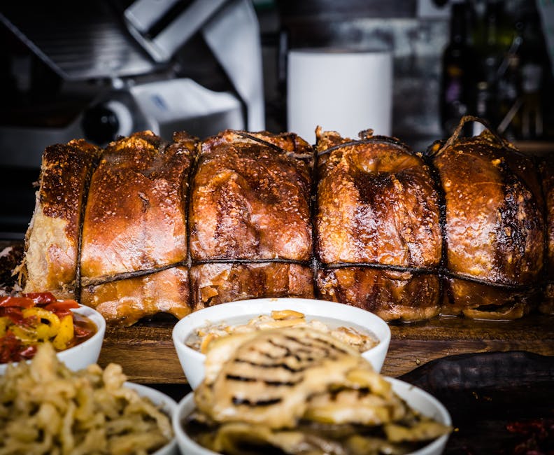 Porchetta arrosto legata sul banco del mercato di Perugia