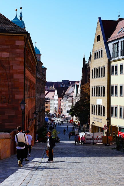 Children walking on cobbled street