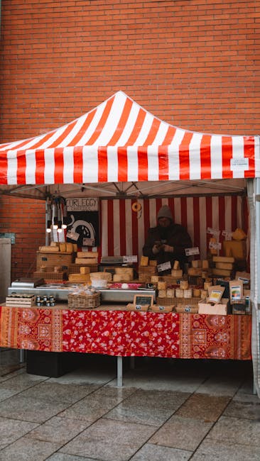 Indoor marketplace vendors selling cheeses in Perugia
