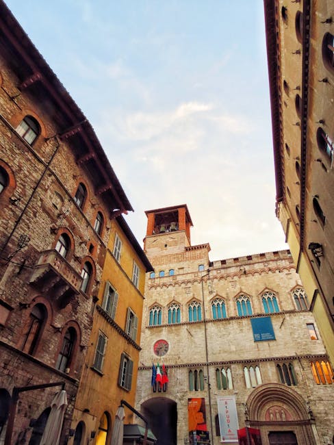 Perugia evening street lined with food shops and warm lights