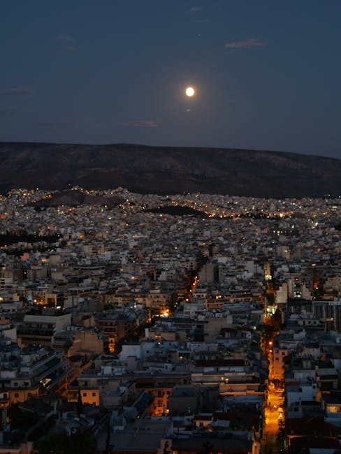Rooftop view of Athens skyline at night