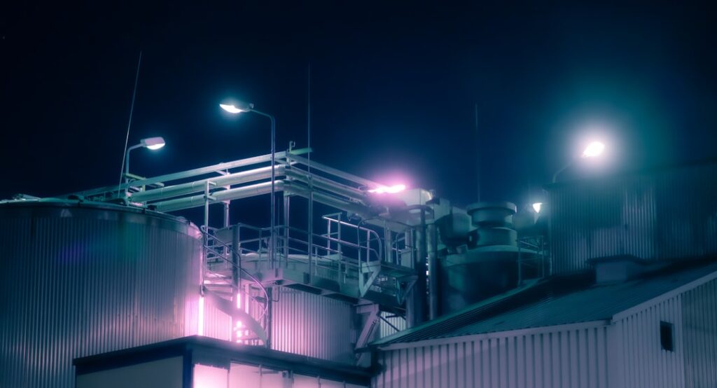 Technopolis gasworks lit up at night