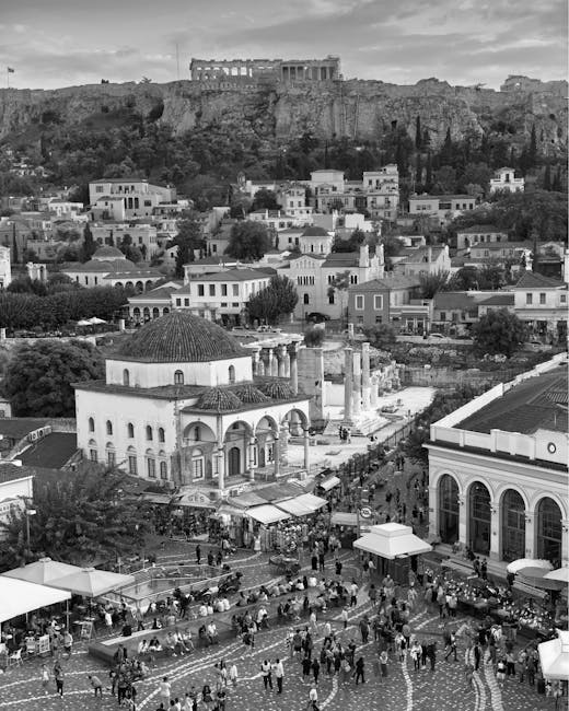Monastiraki square at night during a free screening with stalls