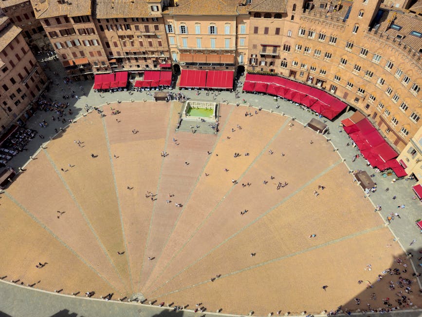 Aerial view of Siena's Piazza del Campo showing fan-shaped square and Fonte Gaia