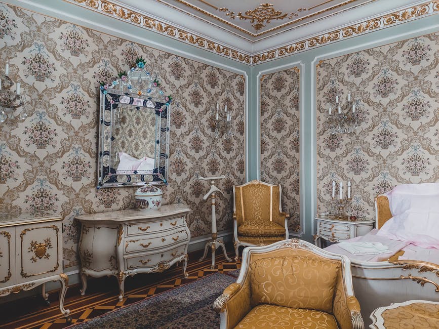 Ornate palace bedroom in Rhodes with gilded chairs and patterned wallpaper