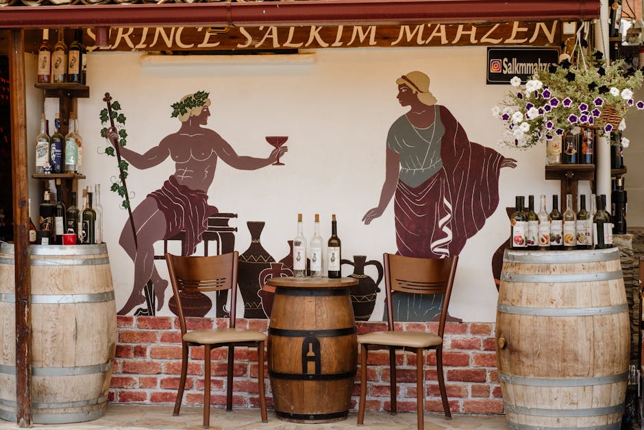 Wine barrels and bottles in Rhodes shop with classical mural backdrop