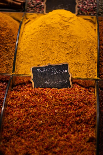 Containers of Turkish saffron and yellow spice labeled at Rhodes market