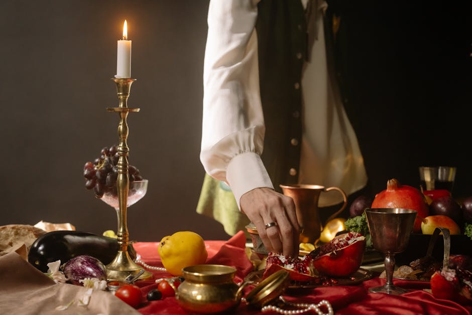 Tavola imbandita per un banchetto medievale a lume di candela