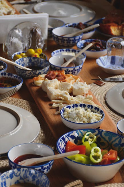 Greek breakfast spread on a terrace with sea view