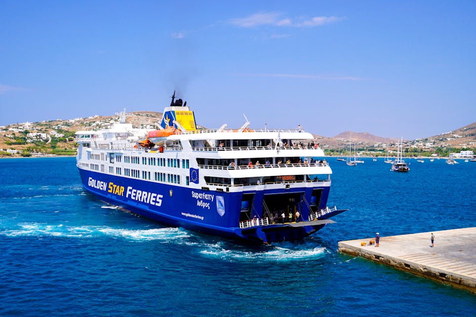 Large Golden Star ferry arriving at Mykonos port under clear sky