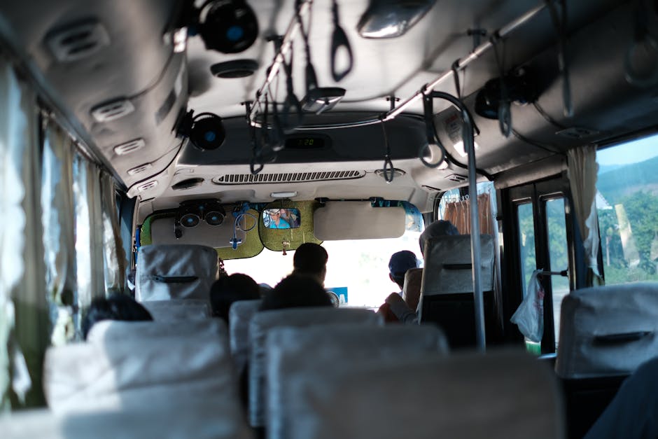 Interior of a local bus with passengers on route to Kotor