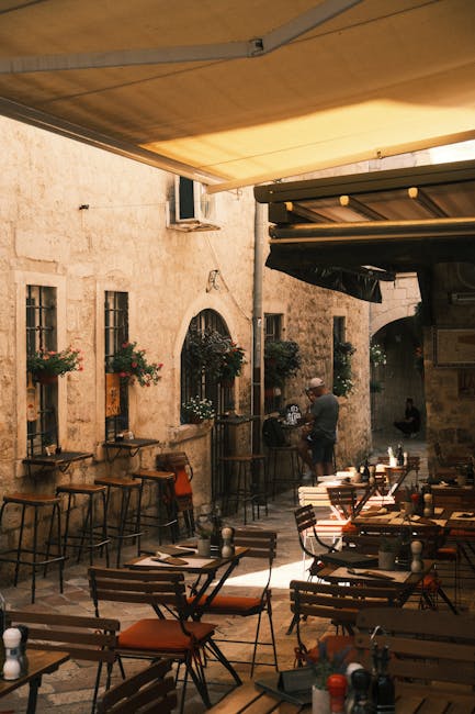Interior of a local tavern in Kotor with wooden tables