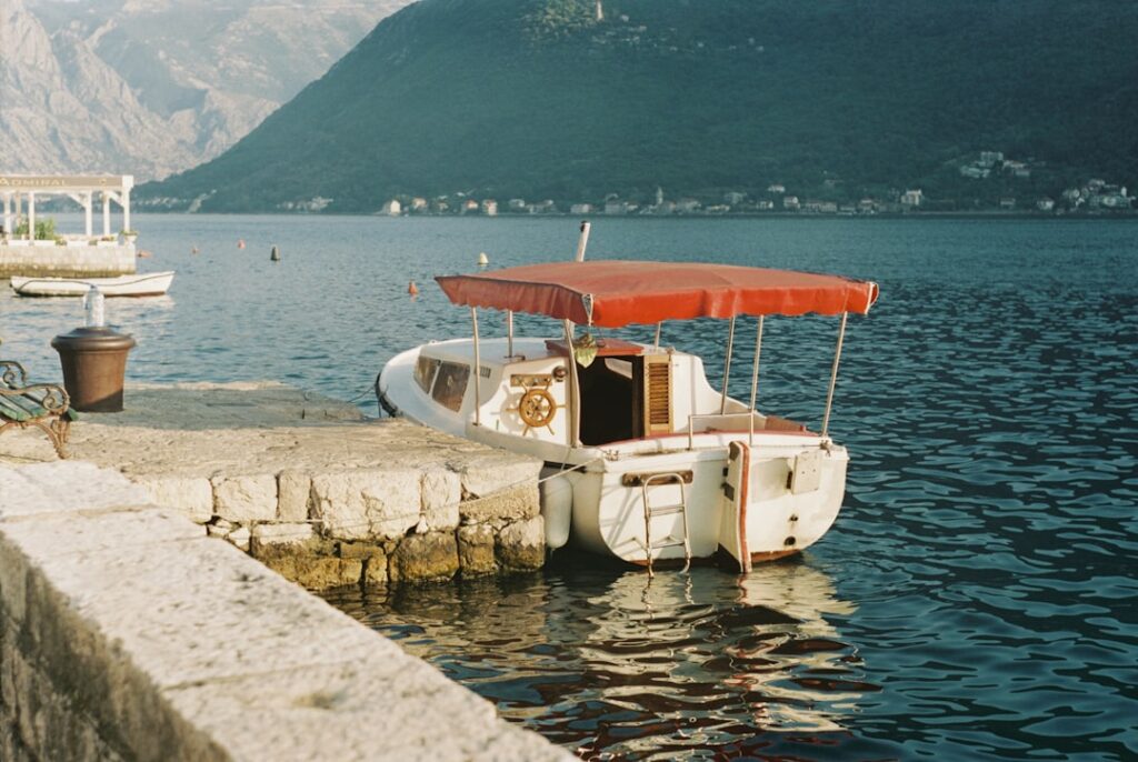 Small wooden boat from Kotor pier to Perast