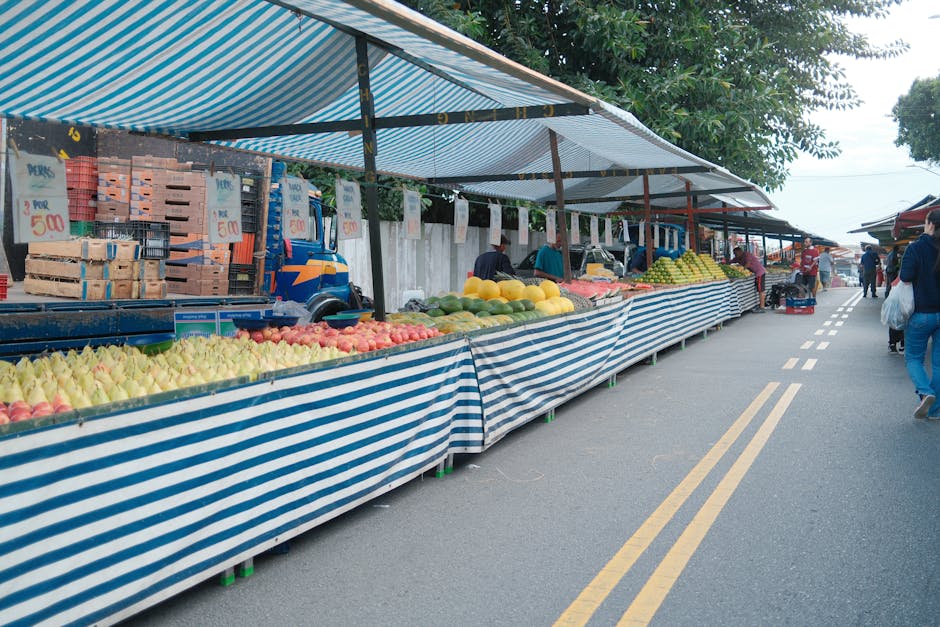 Outdoor market stalls with fresh produce in Tirana
