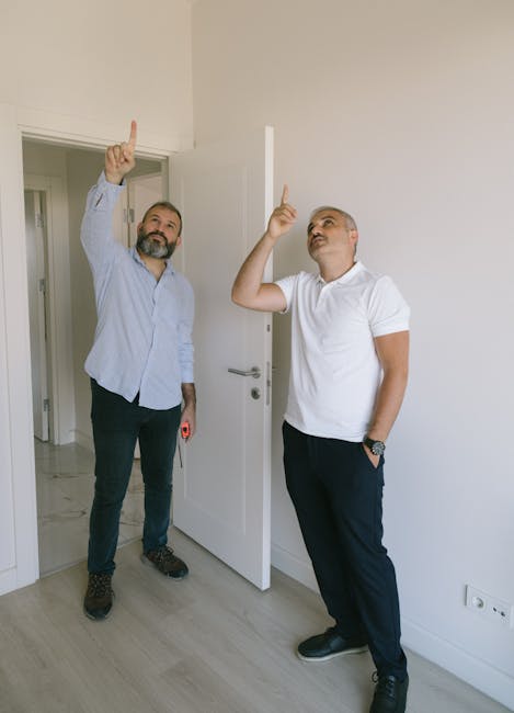 Traveller inspecting apartment interior with a checklist in a bright living room