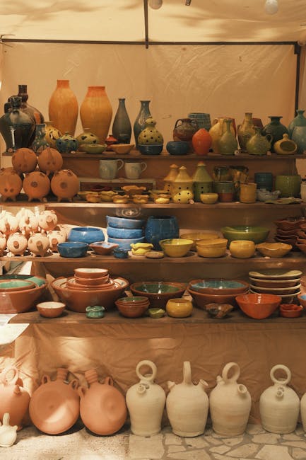 Shelves of handmade ceramics and jugs displayed at a Tirana market