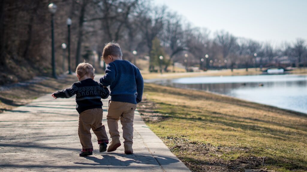 Local family walking through Rinia Park in the afternoon