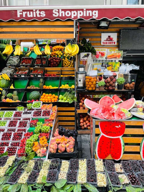 Vibrant fruit stall with watermelons and bananas at a Tirana market