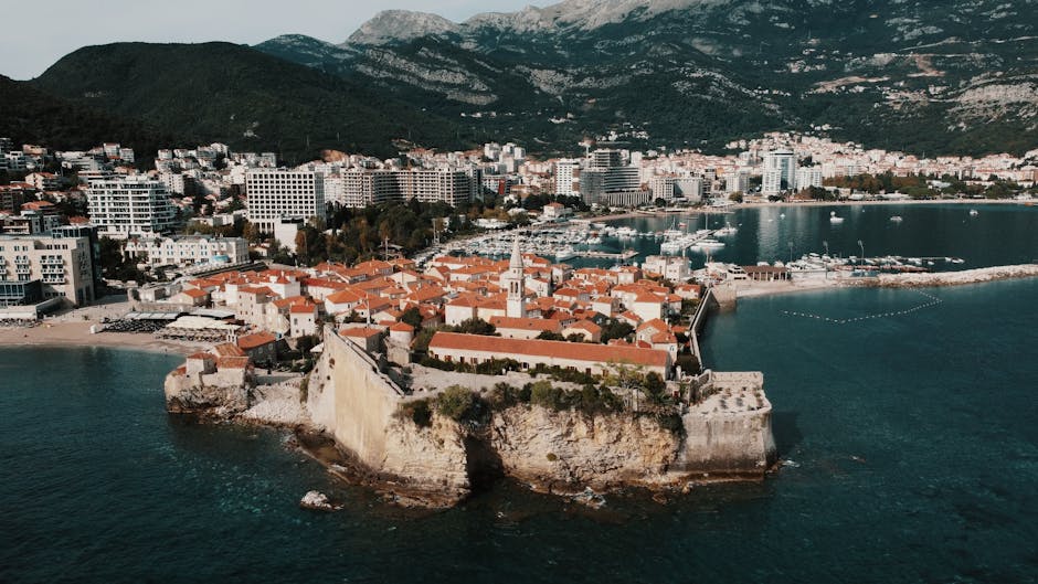 Aerial view of Budva's walled old town peninsula, Montenegro coastline