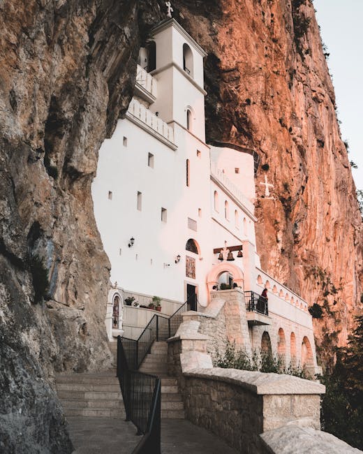 White Ostrog Monastery built into a steep cliff face in Montenegro