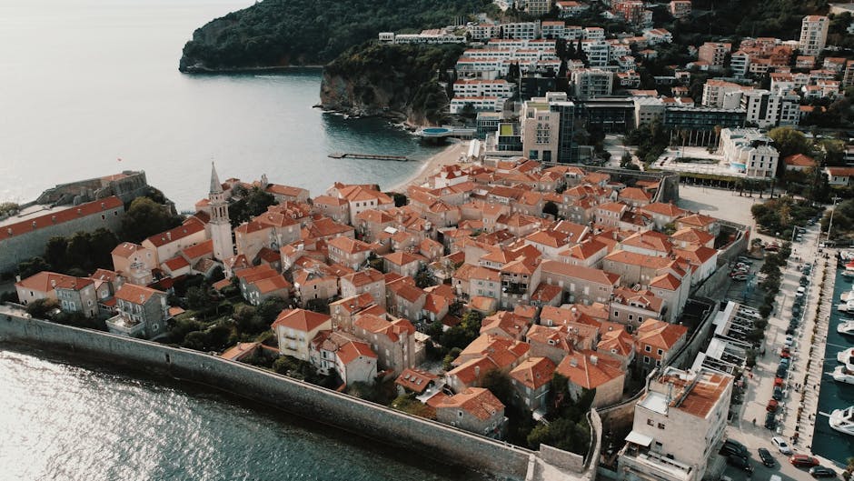 Aerial view of Budva's walled old town and terracotta roofs, Montenegro