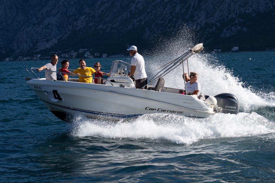 Speedboat carrying passengers across the Bay of Kotor waters near Montenegro