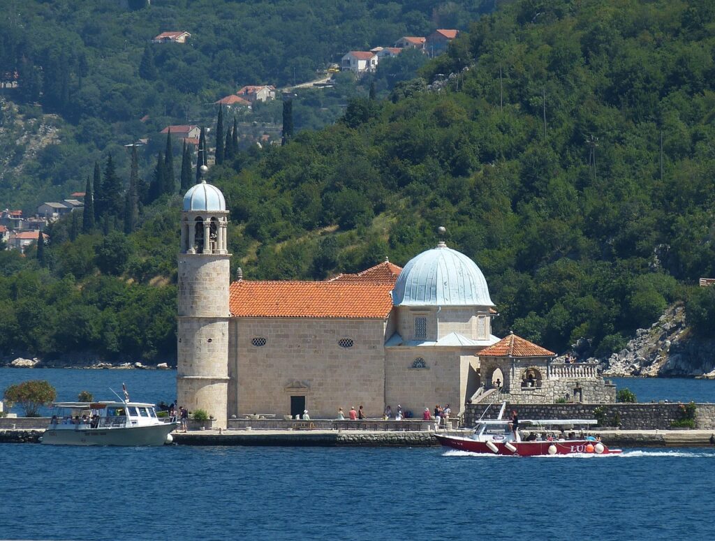 Boats near Our Lady of the Rocks church on Bay of Kotor, Montenegro