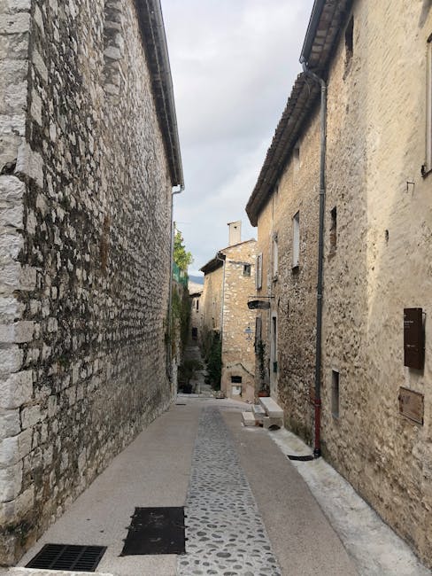 Vuno stone village narrow alley sunset