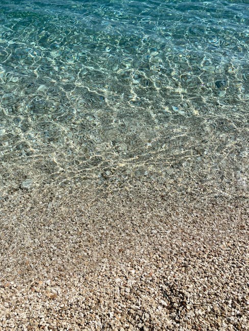 Dhermi beach pebbled shore with turquoise water
