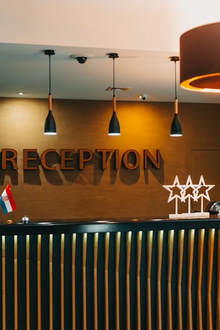 hotel reception desk lit at night