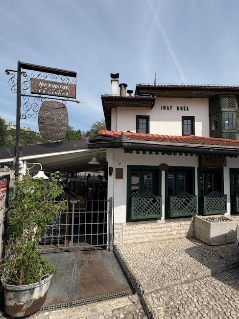 Outdoor seating at Restaurant Lička Kuća with traditional meal