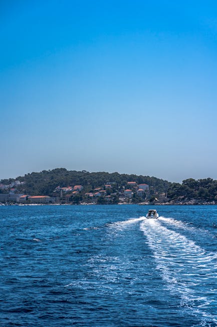 Small wooden speedboat approaching Palmizana harbor, Pakleni Islands
