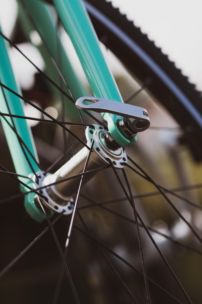 Tourist checking bicycle tires on Hvar Riva
