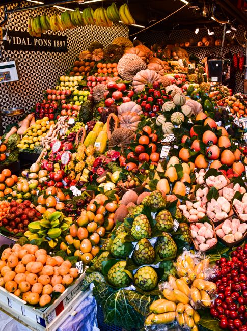 Colorful market stalls with produce in Barcelona