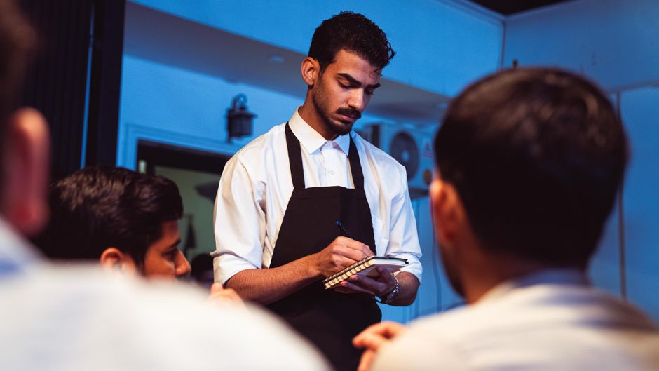 Server taking an order in a restaurant