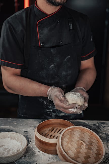 Chef professionista prepara un piatto senza glutine in cucina